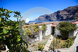 Residential apartments with sea port of Los Gigantes in the background