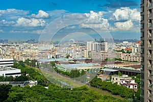 residential area in chinese suburb with rainbow