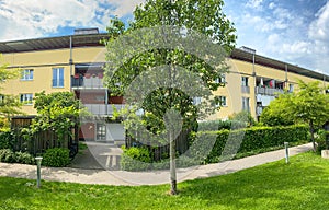 Residential area with ecological and sustainable green residential buildings, low-energy houses with apartments and green
