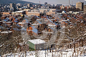 Residential area of typical standardized red brick houses in city Zlin in winter photo