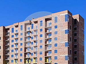 Residential brick house under construction.