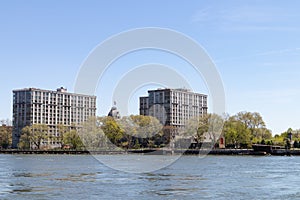 Residential Buildings in the Roosevelt Island Skyline along the East River in New York City during Spring