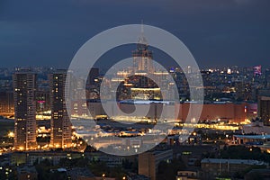 Residential buildings, skyscrapers and roofs at photo