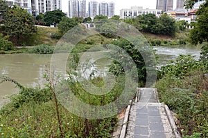 Residential buildings by small river at nanning city, adobe rgb