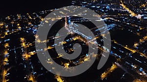 RESIDENTIAL AND COMMERCIAL NIGHT AERIAL VIEW