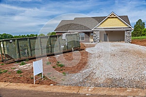 Residential Construction Site With Trash Dumpster