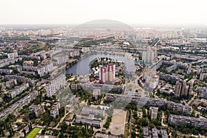 Residential district in a large metropolis with road junctions and houses.