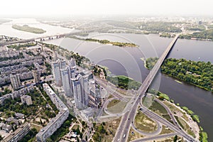 Residential district in a large metropolis with road junctions and houses. View of a newly built residential complex