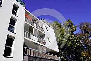 Residential facade high Building and balcony outdoor on blue cloud sky background