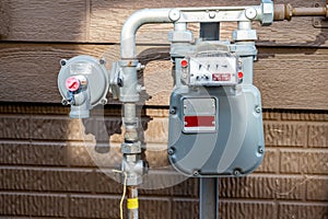 Residential gas meter and pressure regulator