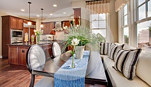 Residential Model Home Dining Nook Table and Kitchen photo