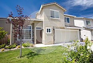 Residential home exterior front with landscaping