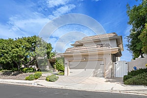 Residential home with two side garages and one house in California