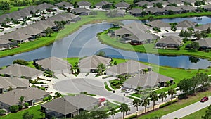 Residential homes in suburban sprawl development in North Port, Florida. Low-density private houses in rural suburbs