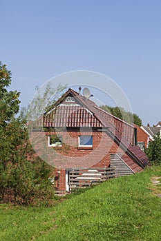 Residential house in the countryside on the dyke