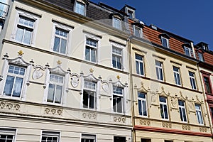 Residential houses with basic facade ornamentation