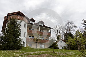 Residential houses with a lawn on a hill in Meersburg