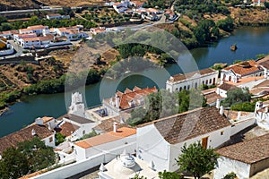 The residential houses on the right bank of Guadiana. Mertola. Portugal photo