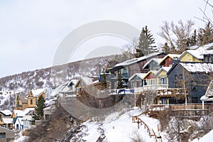 Residential houses on snowy mountain slope in scenic Park City Utah in winter