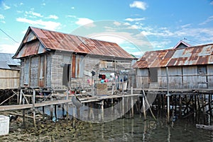 Residential houses on stilts, Maumere, Indonesia photo