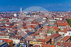 Residential houses in Turin (Piedmont, Italy) view from above . City tiled roofs aerial view