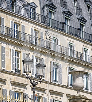 Residential lofts with balconies and windows with shutters