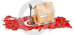 Residential moving service in Turkey, concept. Hydraulic hand pallet truck with cardboard house parcel on Turkish map, 3D