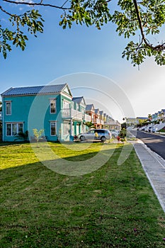 Residential neighborhood of colorful town houses/vacation homes. Upscale gated community residences in Caribbean.