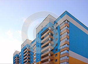 Residential new building against the background of the sky blue