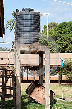 Residential Plastic Water Supply tank on elevated platform in Lethem Guyana