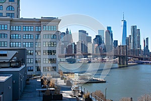 Residential Rooftop Deck with a view of the Brooklyn Bridge and Lower Manhattan Skyline in New York City