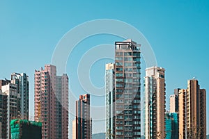 Residential skyscraper buildings, skyline and blue sky in Hong Kong