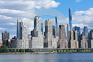 Residential Skyscrapers along Riverside Blvd in the Upper West Side of Manhattan. In front of the buildings is an elevated section