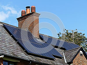 Residential solar panels on rooftop used to generate electricity