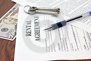 Residential Tenancy Agreement with money and keys photo