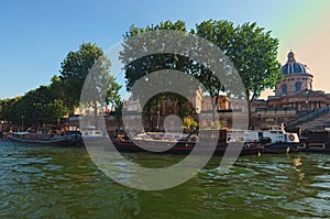 Residential vintage barge on the Seine River. A great place for living at Paris, France. Sunny spring day