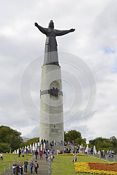 Residents of the city of Cheboksary walk around the monument to the Mother Patroness. Cheboksary. Russia