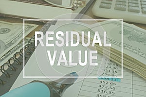 Residual value. Office table with business documents. photo