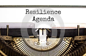 Resilience agenda symbol. Concept word Resilience agenda typed on retro old typewriter. Beautiful white background. Business and