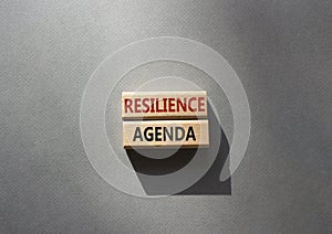 Resilience agenda symbol. Wooden blocks with words Resilience agenda. Beautiful grey background. Business and Resilience agenda
