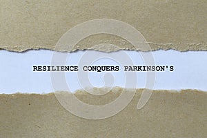 resilience conquers parkinson\'s on white paper