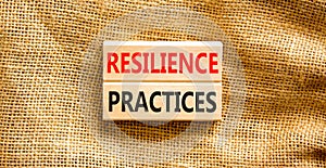 Resilience practices symbol. Concept word Resilience practices typed wooden blocks. Beautiful canvas table canvas background.