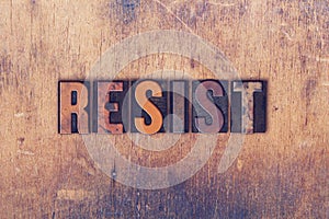 Resist Concept Wooden Letterpress Type photo