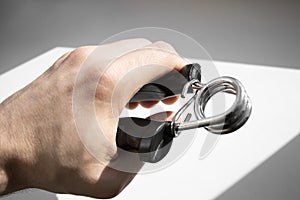 Resistance band for hand exercise on a white background