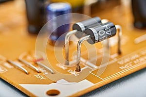 Resistors, capacitors and other electronic components of micro chip inside the computer close up