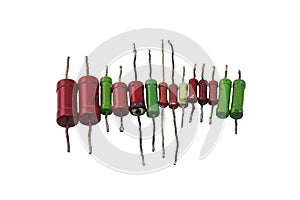 Resistors row: color-coded metal-film resistors with long leads for through hole mounting. isolated on white background