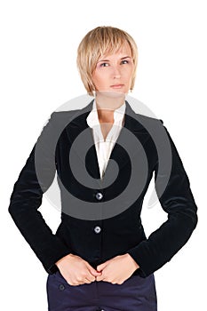 Resolute blond woman in suit.