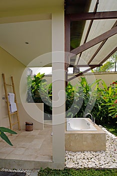 Resort bathroom shower semi outdoors