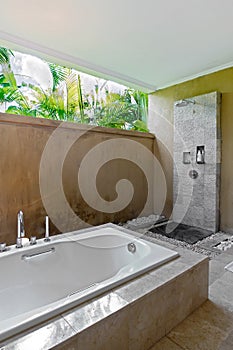 Resort bathroom shower semi outdoors