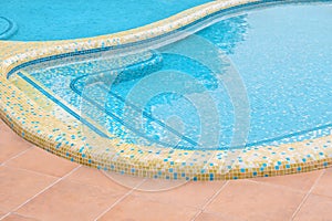 Resort design pool resort swimming pool mosaic tile pool border tile blue water hotel background water surface. Small